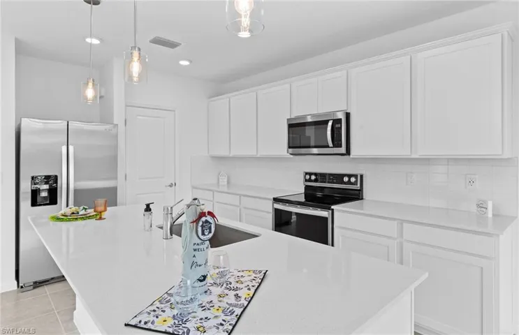 Interior photos are of a similar home - Same floor plan (Rowan)