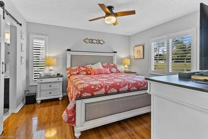 Owner bedroom enjoys beautiful view of golf course and private bathroom with walk in closet.