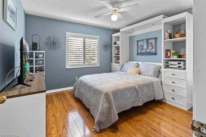 Guests will enjoy this comfortable bedroom and calming blue.