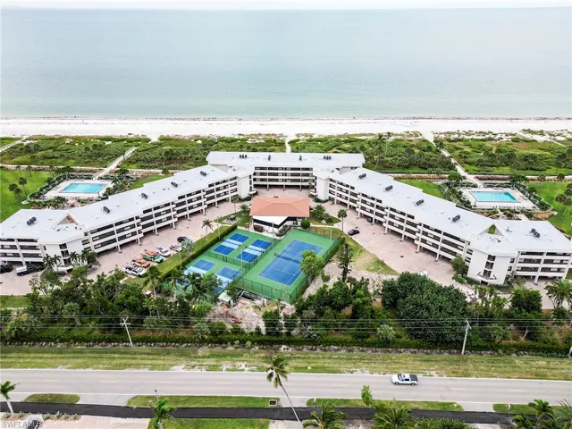 Aerial view of a pool and unending shoreline