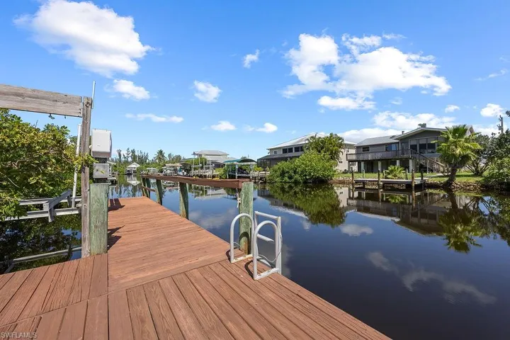 Dock area featuring western water view. Watch beautiful sunsets from your dock.
