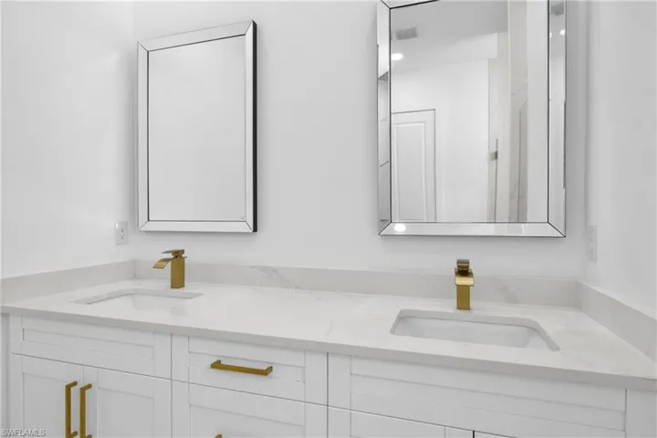 Bathroom with dual bowl vanity