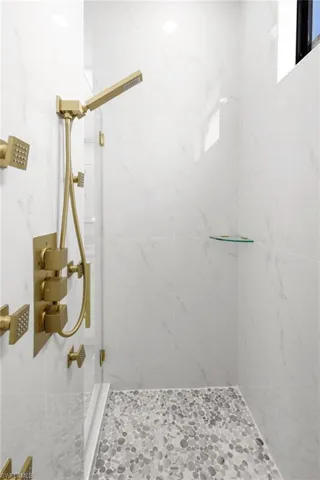 Bathroom with a tile shower