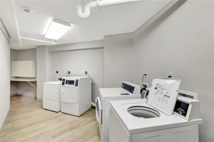 Shared laundry with washer and clothes dryer