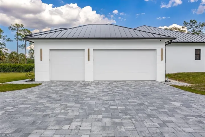 3-Car garage attached, epoxy flooring, mini split (air conditioned)!