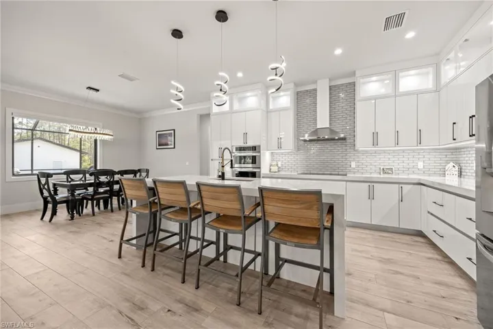 Quartz Counter Tops!  Pendant Lighting!  Lighting to Upper Cabinetry!