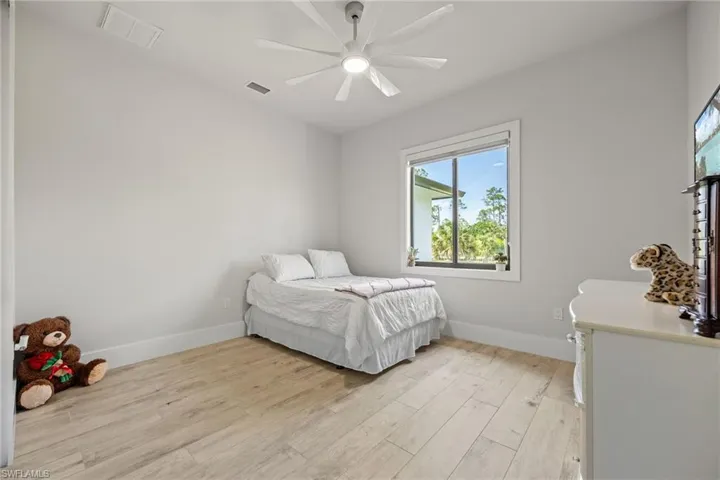 Guest Bedrooms are spacious!  Motorized window coverings!
