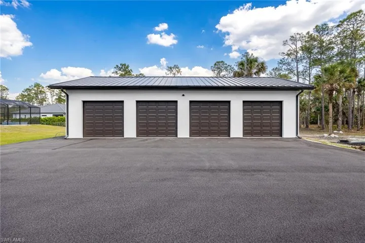 Detached, BRAND NEW, (4) car garage stall customized to match the home!