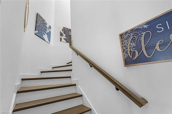 Front stairway leading to upstairs home