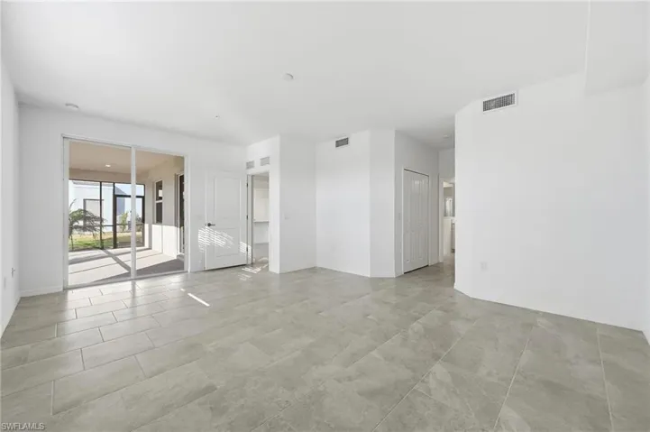 Empty room with baseboards