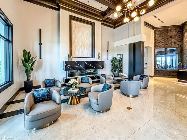 Community lobby with coffered ceiling and crown molding