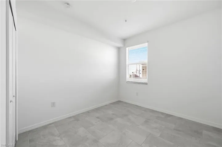Empty room with baseboards