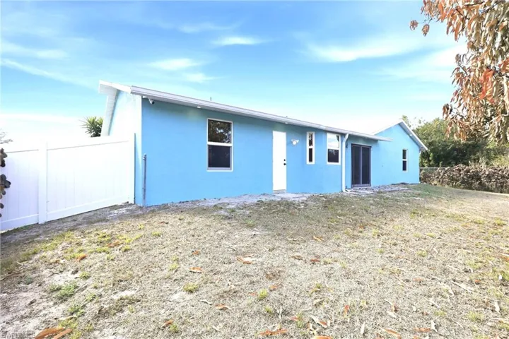 Ranch-style home with stucco siding