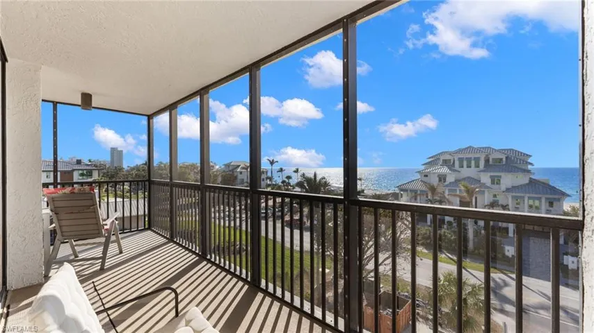 Sunroom featuring a Gulf of Mexico view