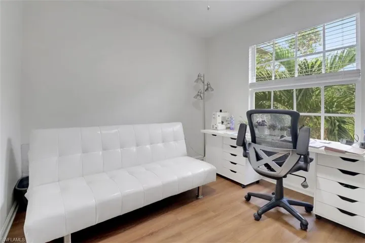 Office featuring a wealth of natural light and light hardwood / wood-style flooring