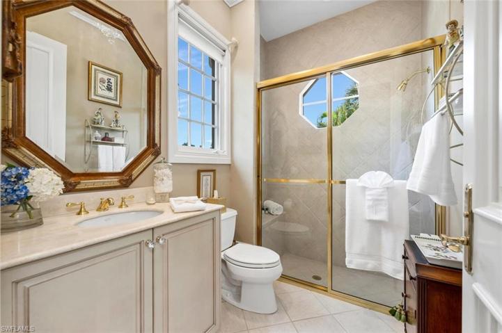 Guest Bath has large, walk-in shower.
