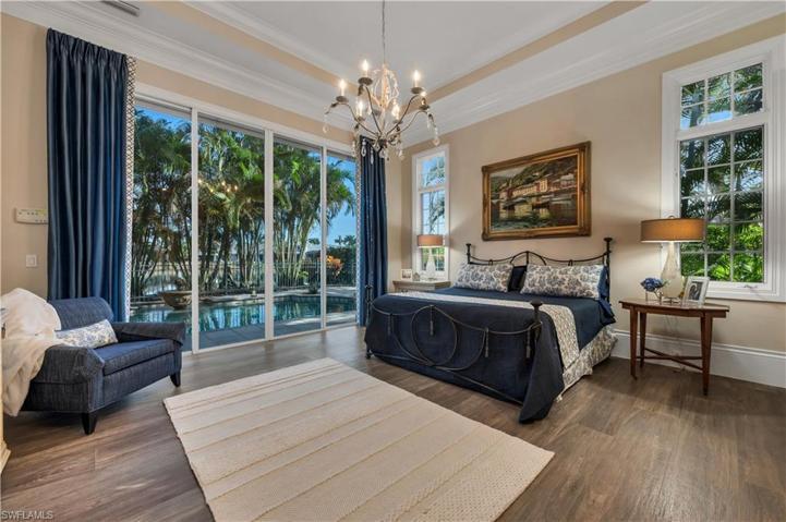 The Master Suite has wood plant ceramic tiles in both the bedroom and closets.  What tranquil views!