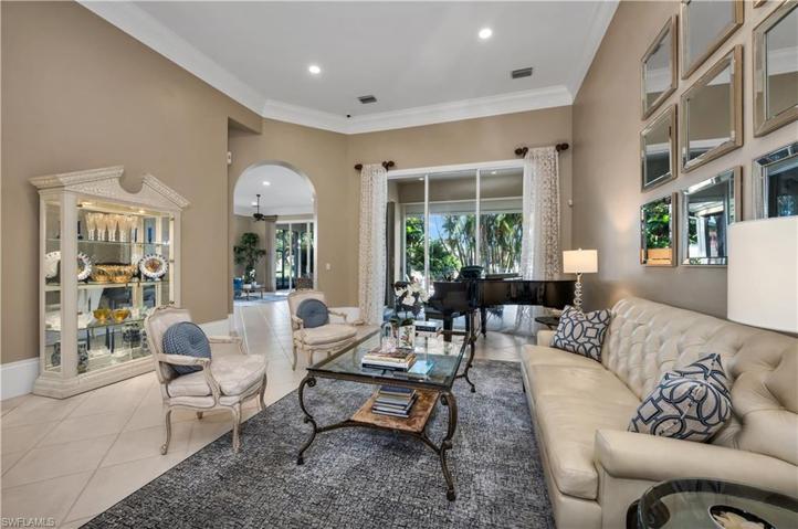 Gorgeous lake views as one enters this meticulously cared for residence, with high ceilings, generous molding, LED lighting, and neutral flooring...all on one level.