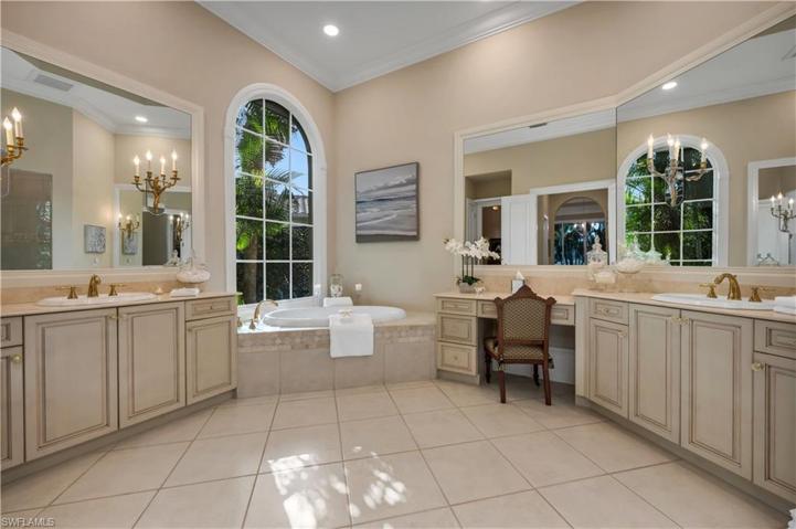 Master bath is huge with a double vanity and a Roman tub for easing all cares away...