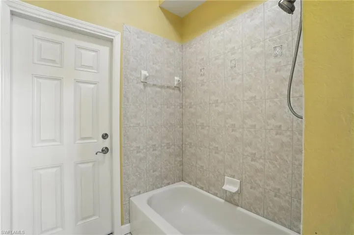 Bathroom featuring shower / tub combination - Virtually Edited Image