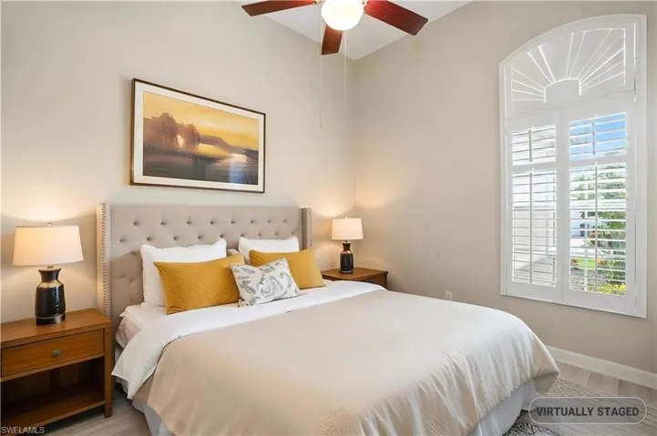 Bedroom with wood finished floors - Virtually Edited Image