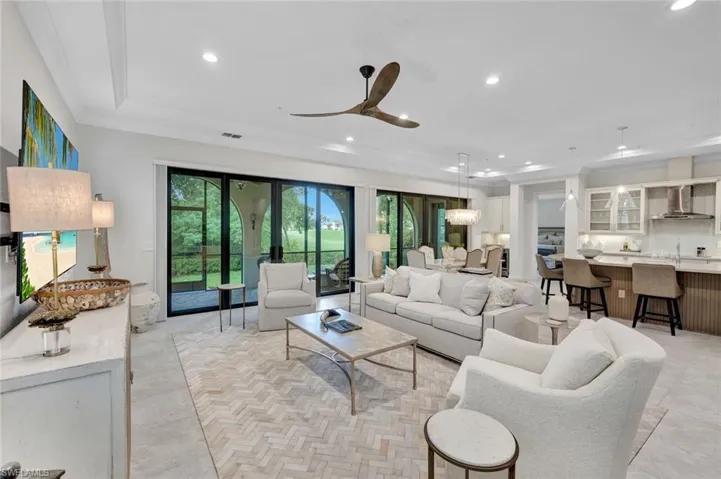 Open and bright floor plan with Hurricane Impact Resistant Doors and Windows, and golf course view