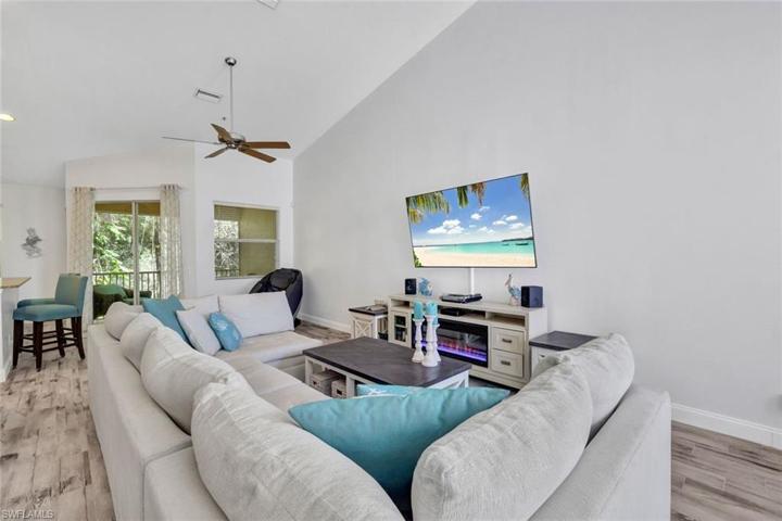 This spacious living area is so light and bright with vaulted ceilings.