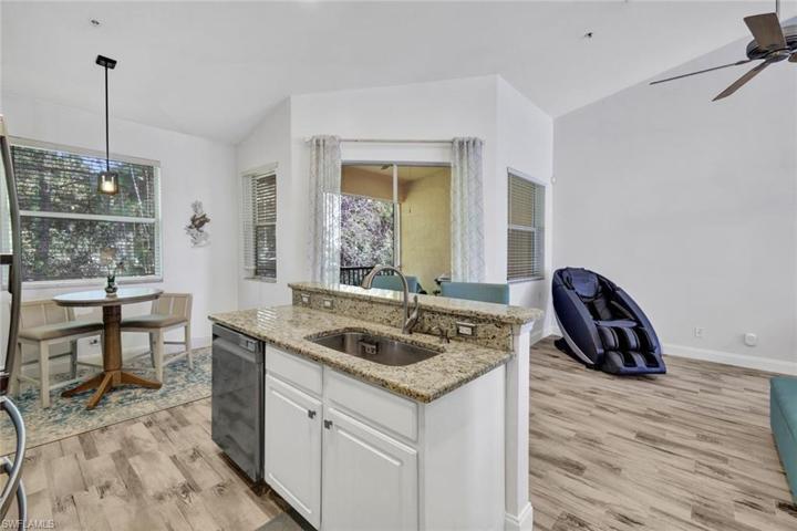 Living, kitchen and dining open to one another.
