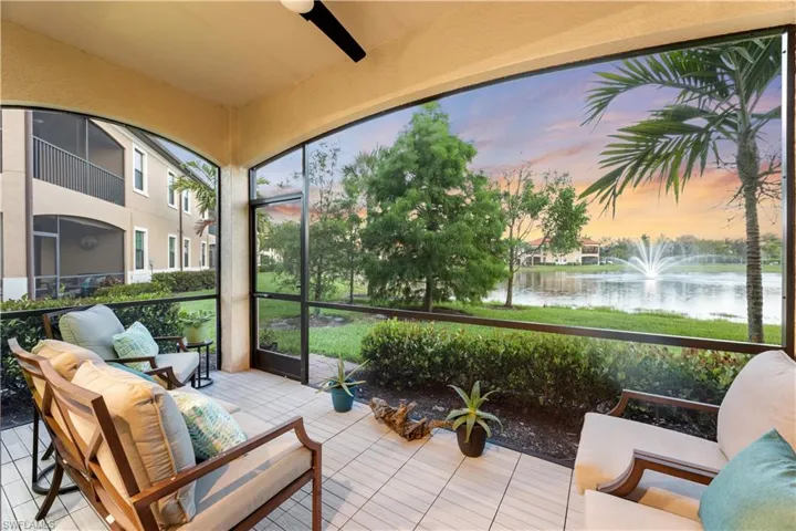 Sunroom featuring a beautifl water view