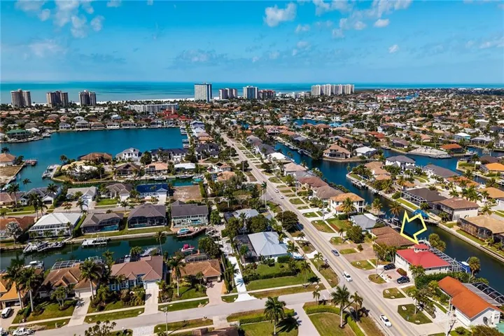 View of urban area featuring a large body of water and nearby suburban area