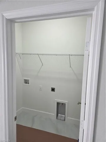 Laundry area featuring hookup for a washing machine and electric dryer hookup