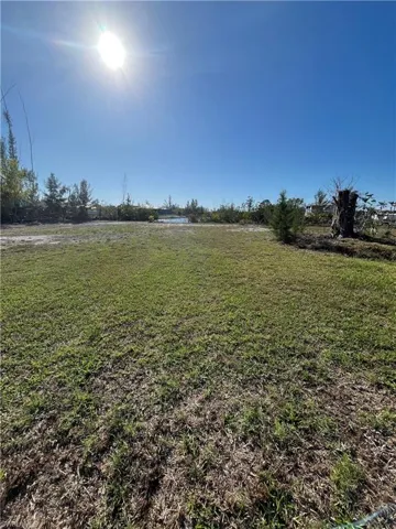 View of grassy yard featuring a view of rural / pastoral area