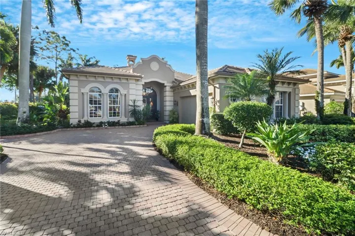 Mediterranean / spanish house with a garage