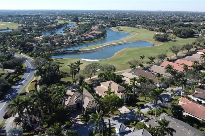 View of swimming pool with a patio and a lanai