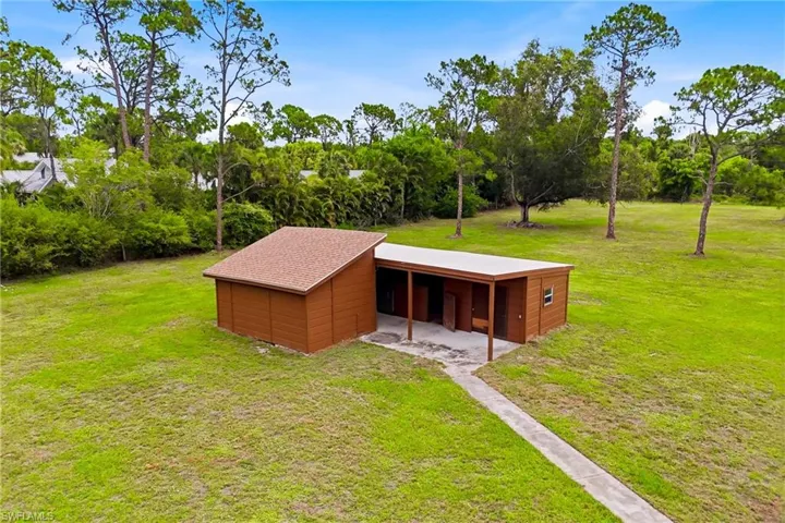 Stable with 2-stall horse barn complete with a tack room, storage room, and a dedicated livestock area.