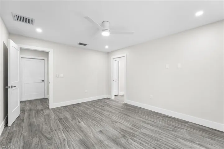 Master Bedroom featuring recessed lighting, wood style tile finished floors, and ceiling fan