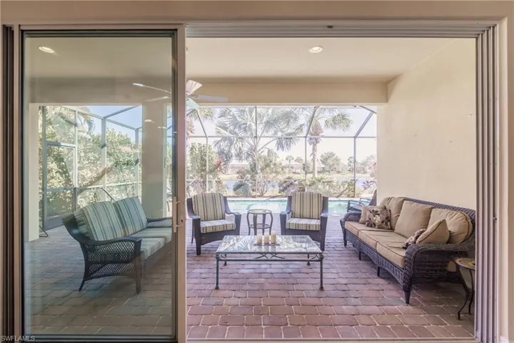 View of Lanai with sliders open from Familu room.