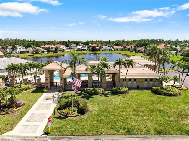 Drone / aerial view featuring a residential view and a water view