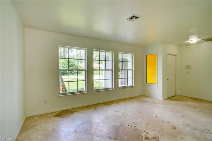 Empty room with healthy amount of natural light