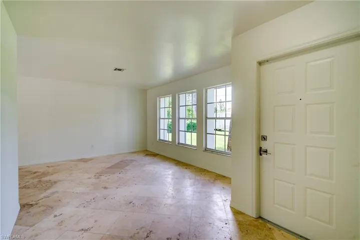 Foyer with baseboards