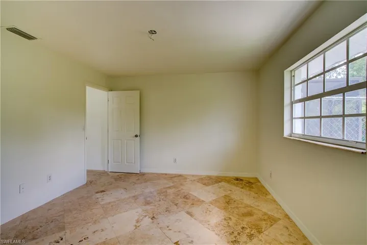 Empty room with baseboards