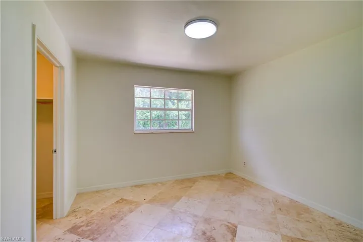 Spare room with baseboards