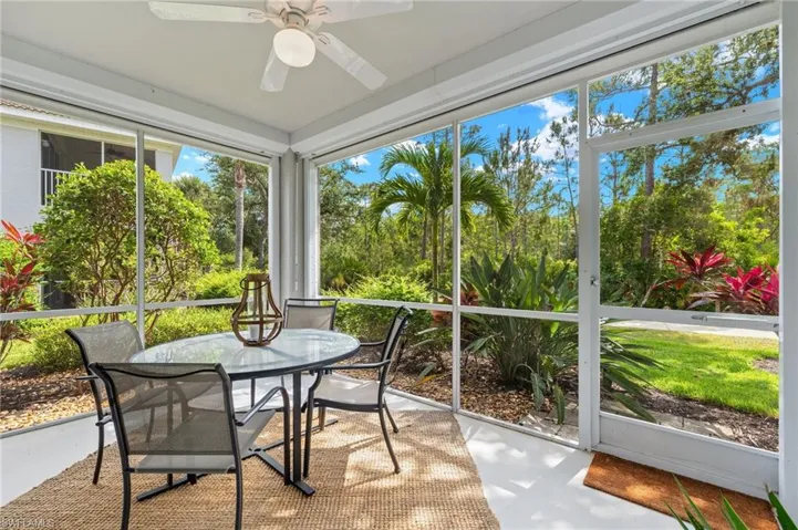 Sunroom featuring ceiling fan