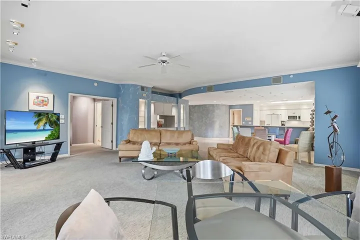 Living, dining and kitchen open to one another.
