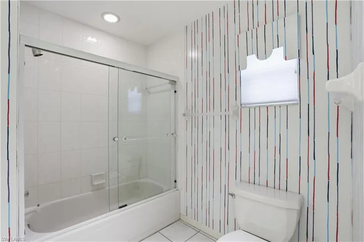 Guest bathroom with tub/shower combination.