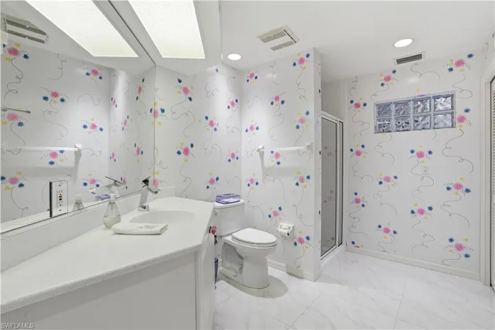 Second guest bathroom with walk in shower.