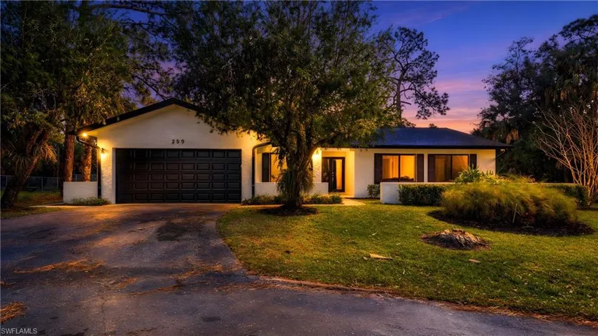 Virtually Staged Twilight view of the front  of the house