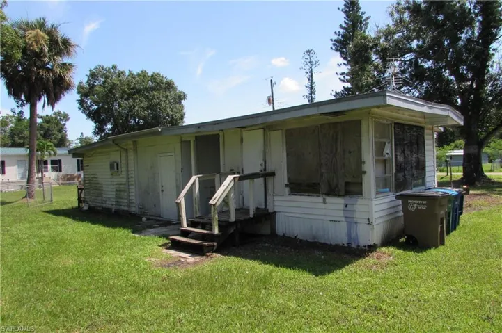 View of front of house with a front lawn