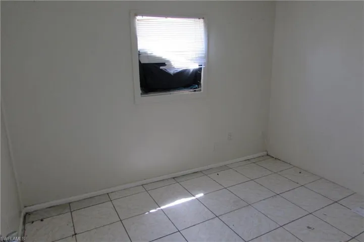View of tiled spare room