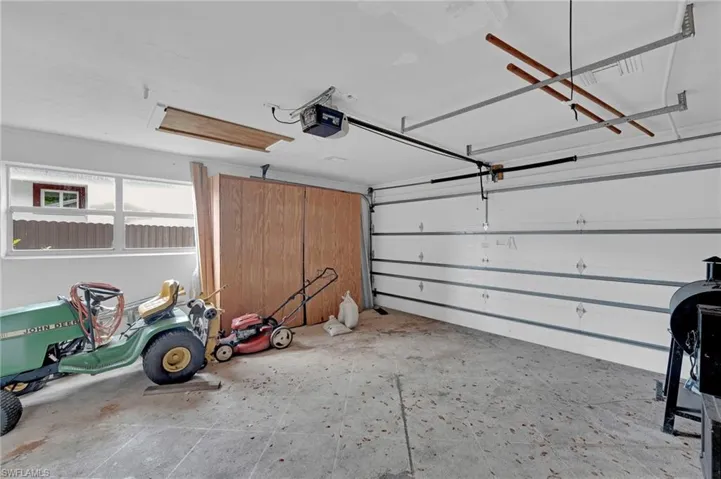2 car garage featuring a garage door opener